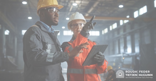two construction workers discussing